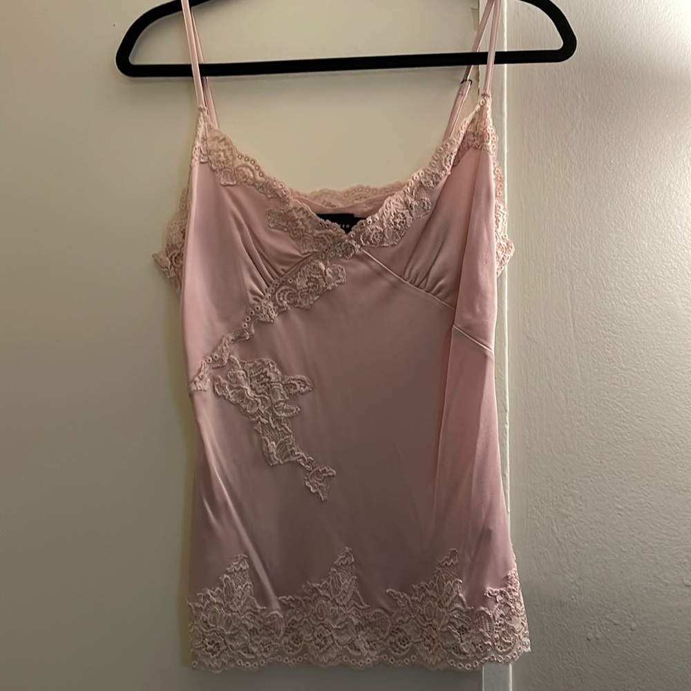 Light dusty pink top. Size L